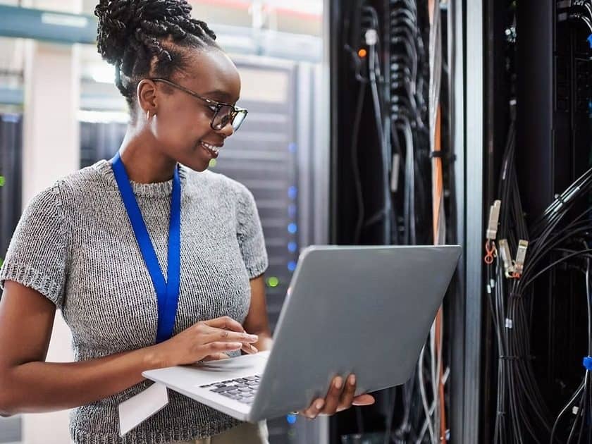 Technician working at a server rack