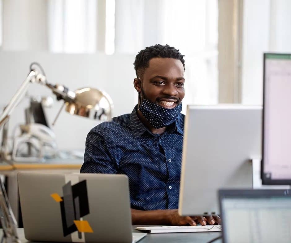 Cybersecurity analyst at his workstation